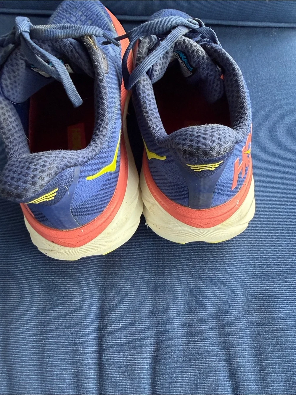 Hoka Women's Blue Running Shoes with Coral and Yellow Accents